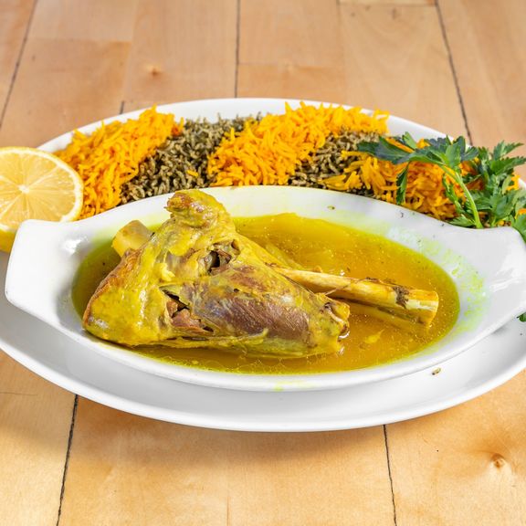 The picture of Lamb shank with baghali polo